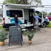 Northern Zone Mobile Health and Wellness Team bus set up 