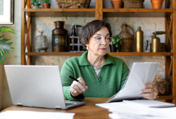 Woman looks at form