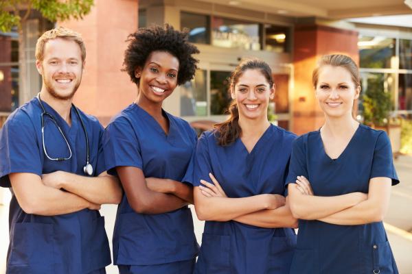 Nurses standing outside