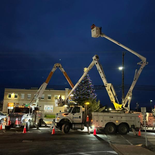 NSP trucks decorate holiday tree at Aberdeen Hospital. 