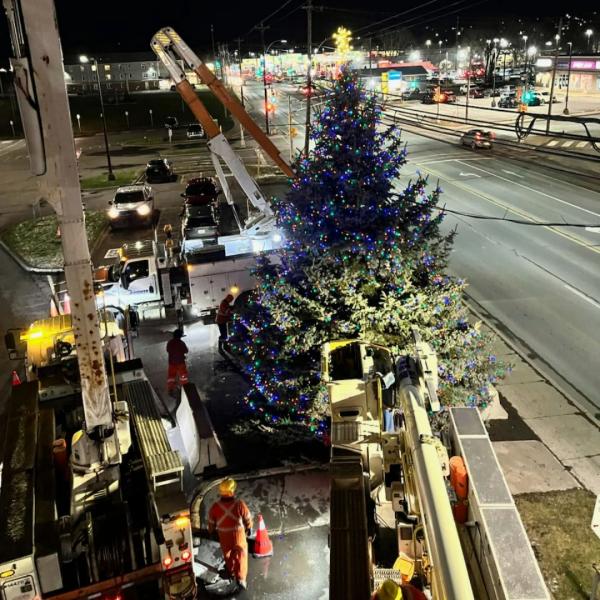 NSP trucks decorate holiday tree at Aberdeen Hospital. 